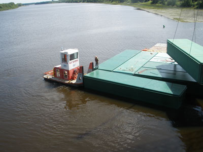 Pier construction, boat pushing barge