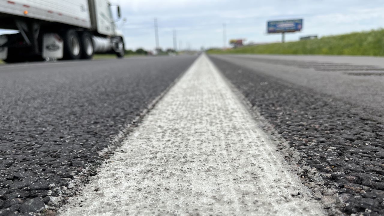 Photo showing improved visibility of enhanced pavement striping